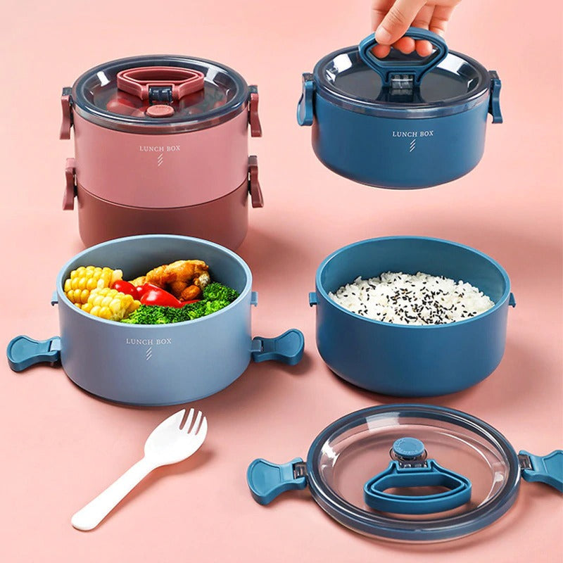 lunch box ronde bleu et rouge avec nourriture 